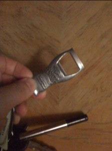 A Samuel Adams bottle-opening keyring