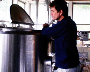 Paul Dlugokencky Paul Dlugokencky stirs the wort at his Blind Bat Brewery