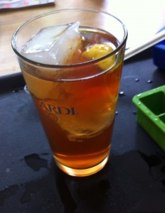 Photo Jul 19, 12 39 15 PM iced tea with large ice cubes and a slice of lemon in clear pint glass