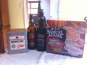 20120817-170102.jpg A pack of Sixpoint Brownstone, 2 bottles of Orchard Gate Gold JK's Scrumpy Hard Cider, a bottle of Samuel Adams Stony Brook Red, and a case of Samuel Adams Harvest Collection 2012