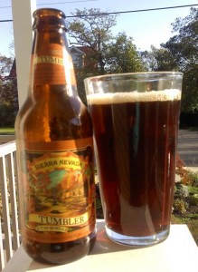 A bottle of Sierra Nevada Tumbler Autumn brown ale with a pint glass filled with Tumbler