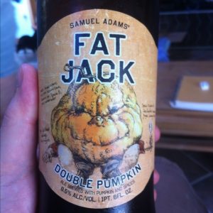 20121028-133103.jpg Held bottle of Samuel Adams Fat Jack displaying the label.