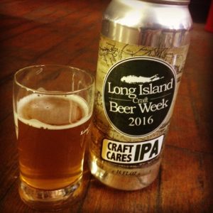 A can of Long Island Beer Week 2016 Craft Cares IPA with a glass containing Craft Cares IPA