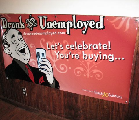 Drunk and Unemployed banner on the wall of the Cortland