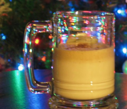 A mug filled with warm Tom and Jerry