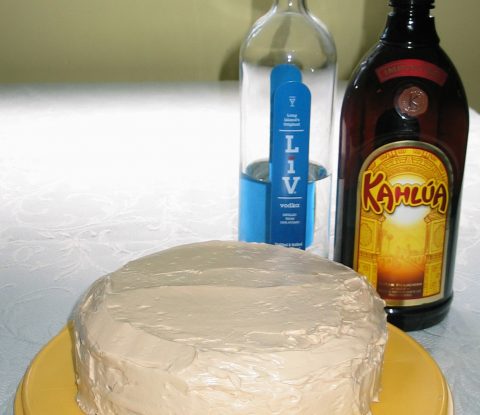 White Russian cake with LiV Vodka and Kahlúa bottles