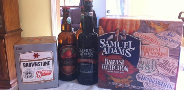 A pack of Sixpoint Brownstone, 2 bottles of Orchard Gate Gold JK's Scrumpy Hard Cider, a bottle of Samuel Adams Stony Brook Red, and a case of Samuel Adams Harvest Collection 2012