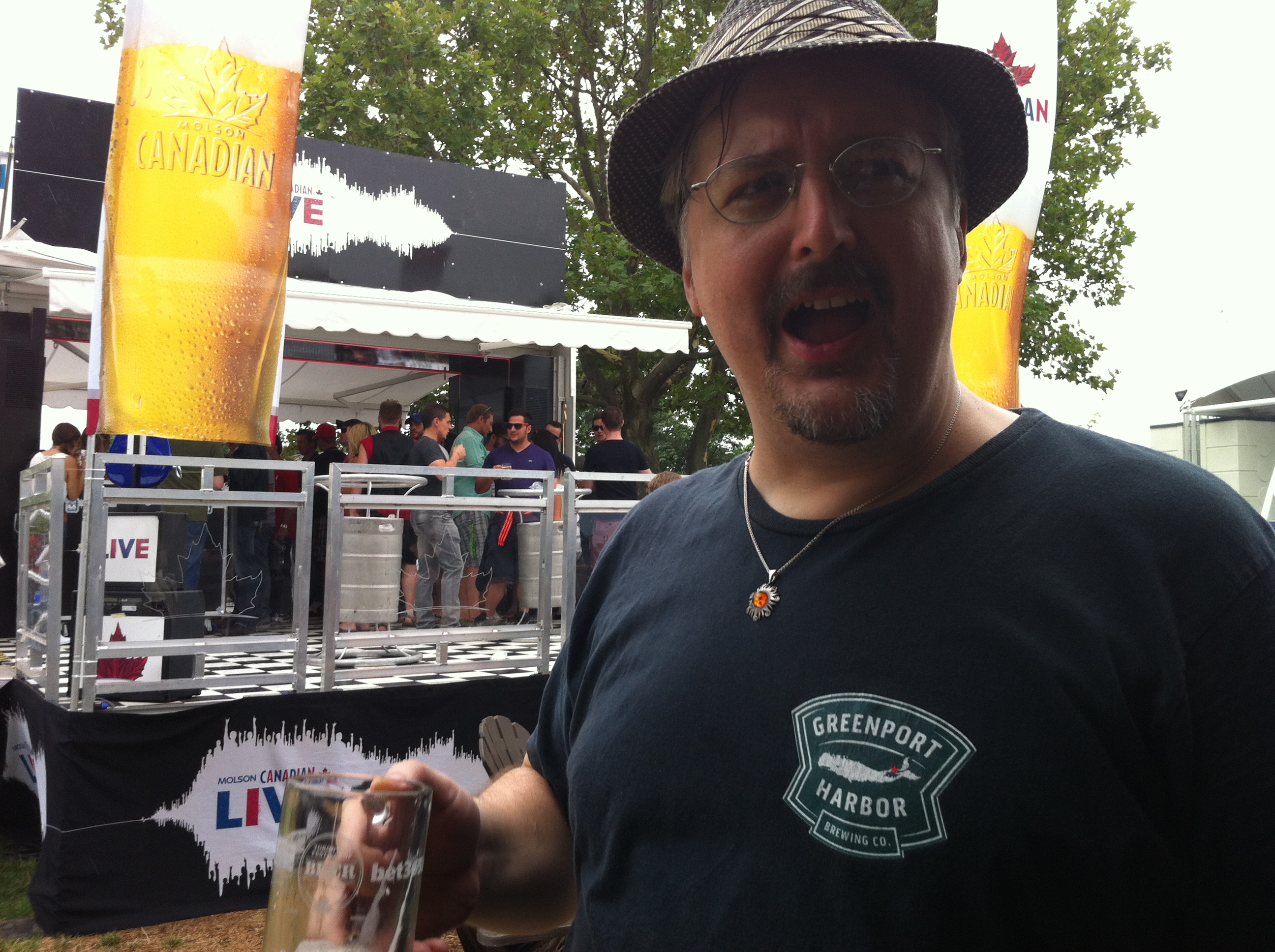 Fervere makes a funny face after finishing a beer at the 2013 Toronto’s Beer Fest by the Molson Canadian tent.