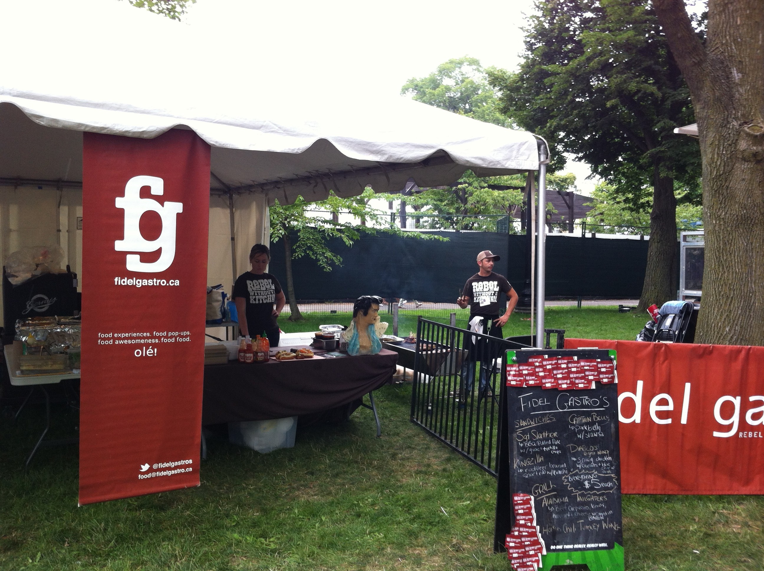 Signs and workers at the Fidel Gastro food tent at Toronto’s Festival of Beer