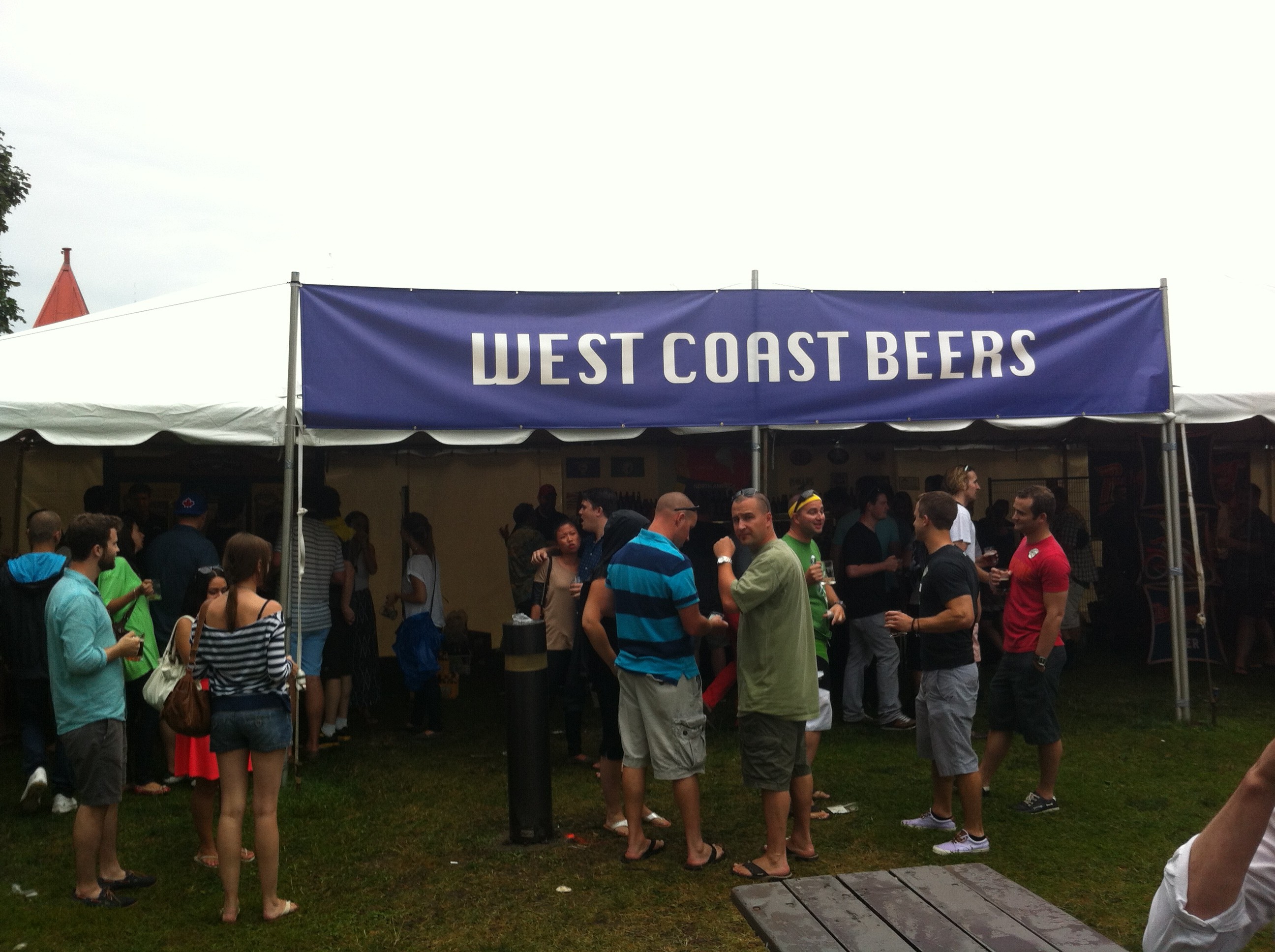 Folks mill around the West Coast Beers tent at Toronto’s Festival of Beers
