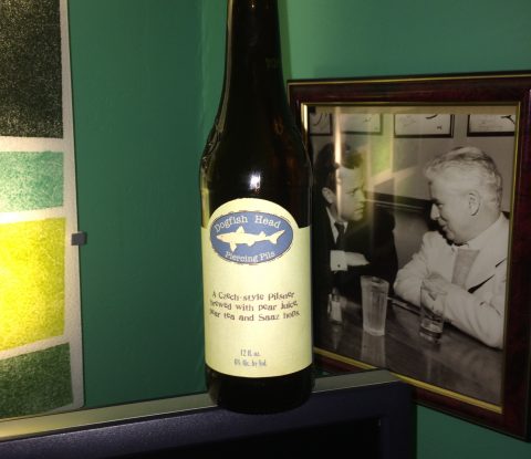 12 oz bottle of Dogfish Head Piercing Pils