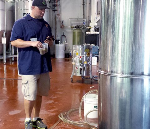 Chris Kelley waits for his wort to boil before adding hops