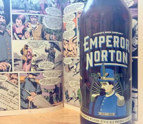 Photo of a bottle of Emperor Norton in front of a page from The Sandman featuring the real Norton