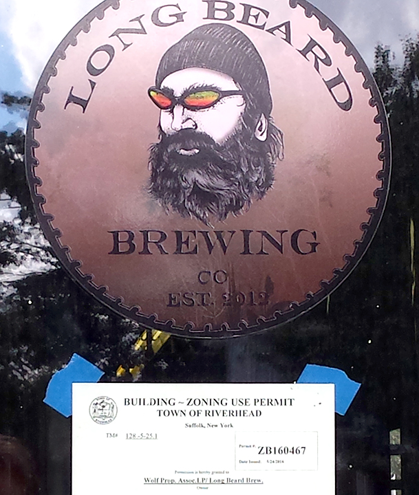 Long Beard Building Permit sign on door